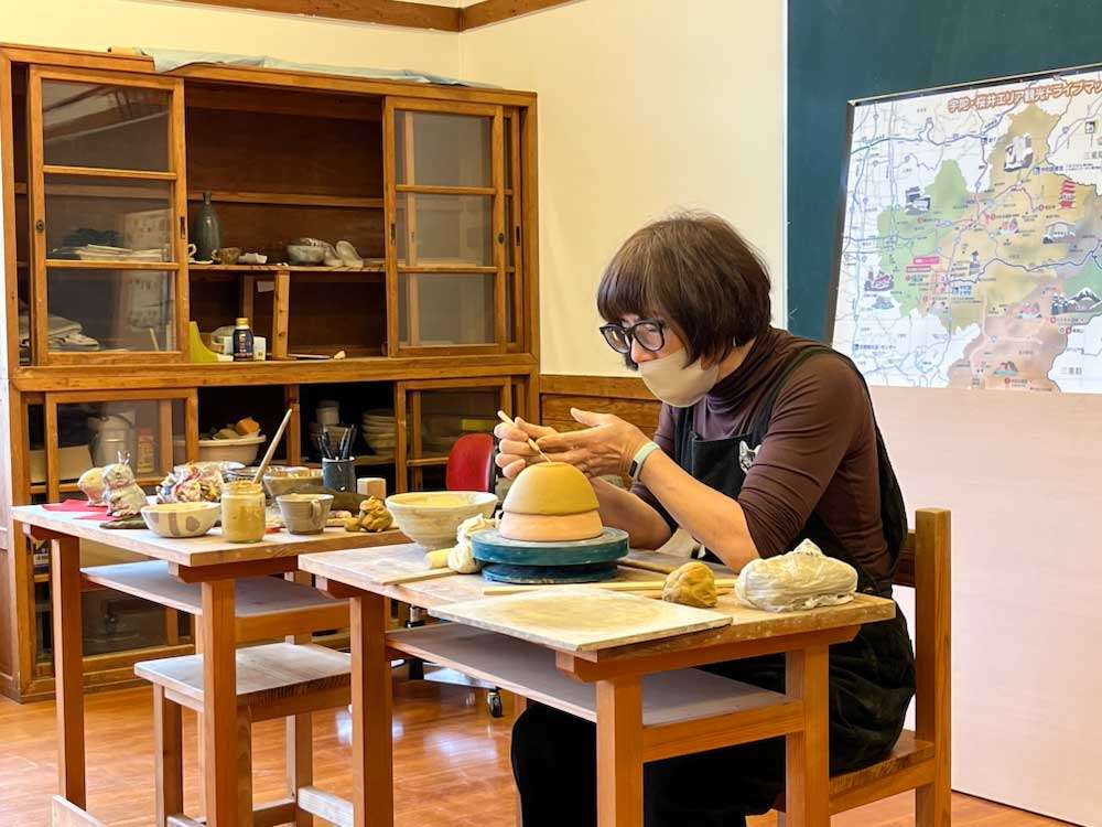 Demonstrating how to make a bowl